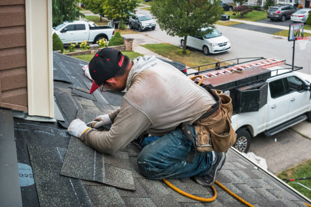 Professional Emergency Roof Repair technician working in Warren, MA